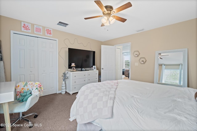 739 Fiddleleaf Cir, Melbourne, FL 32904 - carpeted bedroom with a ceiling fan and a closet