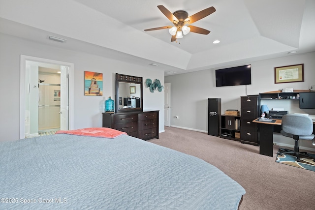 739 Fiddleleaf Cir, Melbourne, FL 32904 - bedroom featuring a tray ceiling, carpet floors, an office area, and recessed lighting
