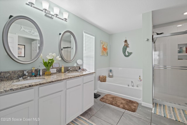 739 Fiddleleaf Cir, Melbourne, FL 32904 - bathroom with a stall shower, double vanity, a bath, and tile patterned flooring