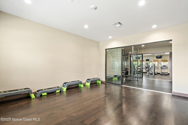 739 Fiddleleaf Cir, Melbourne, FL 32904 - workout area featuring wood finished floors and recessed lighting
