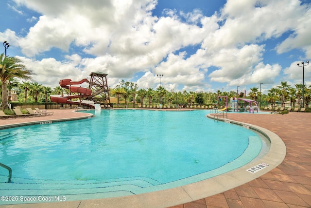 739 Fiddleleaf Cir, Melbourne, FL 32904 - community pool with a water slide