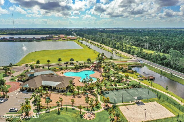 739 Fiddleleaf Cir, Melbourne, FL 32904 - bird's eye view of a large body of water and a pool area