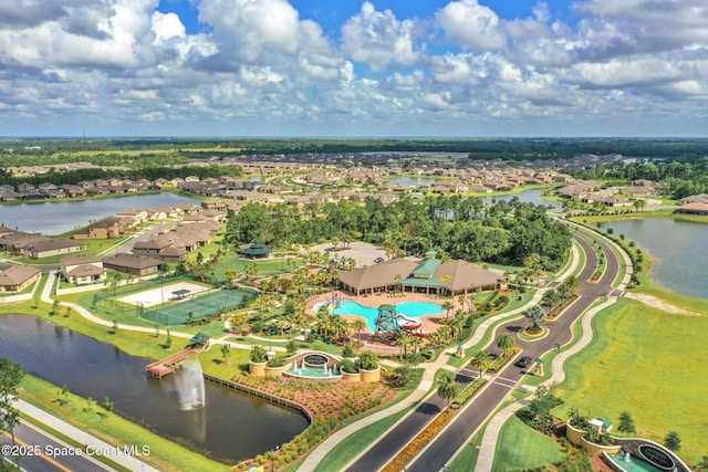 739 Fiddleleaf Cir, Melbourne, FL 32904 - aerial view of property and surrounding area with a large body of water and nearby suburban area