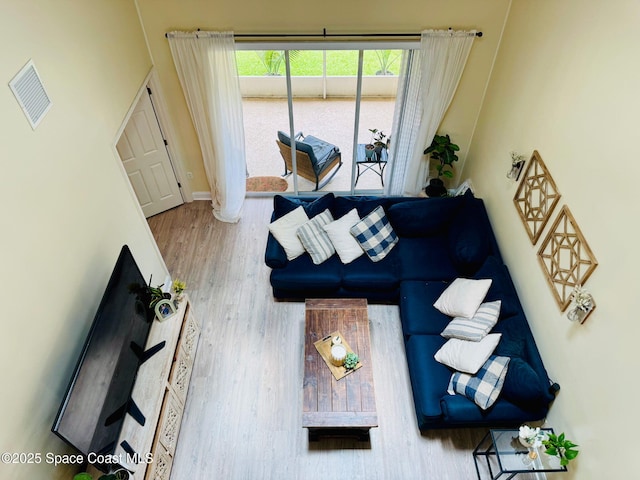 524 Mcguire Blvd, Indian Harbour Beach, FL 32937 - living area with wood finished floors and baseboards