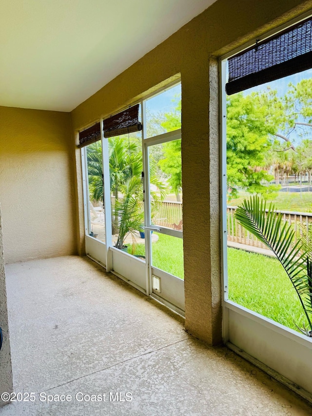 524 Mcguire Blvd, Indian Harbour Beach, FL 32937 - unfurnished sunroom with healthy amount of natural light