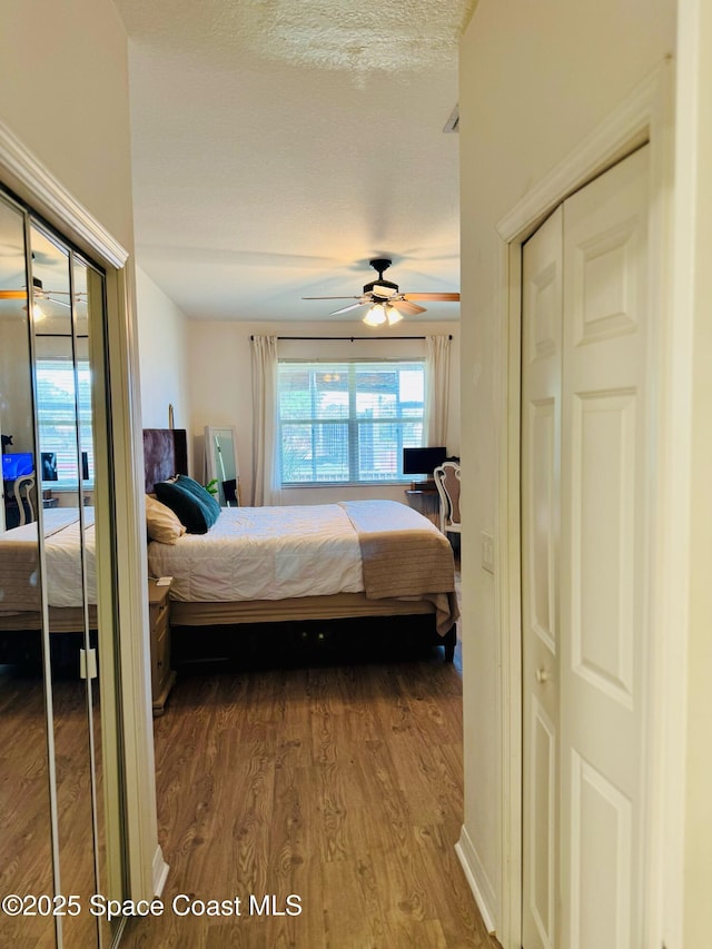 524 Mcguire Blvd, Indian Harbour Beach, FL 32937 - bedroom featuring wood finished floors and ceiling fan