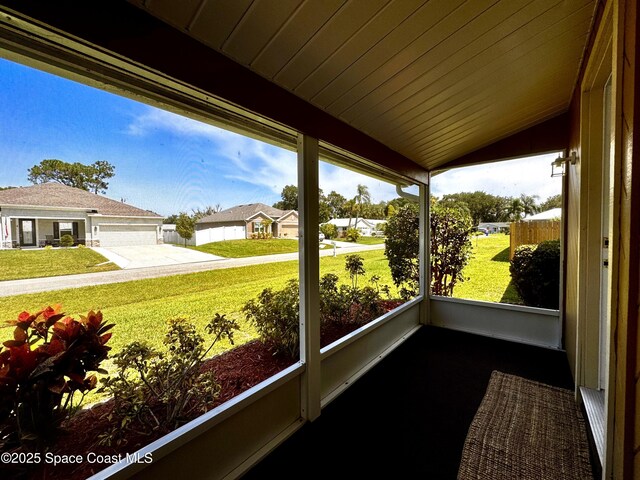 658 Ervin St, Sebastian, FL 32958 - sunroom / solarium with vaulted ceiling and a residential view