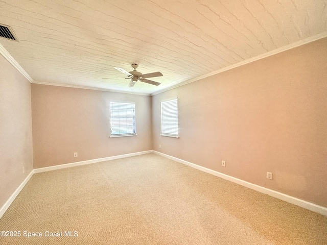 658 Ervin St, Sebastian, FL 32958 - unfurnished room featuring ornamental molding, light colored carpet, and ceiling fan