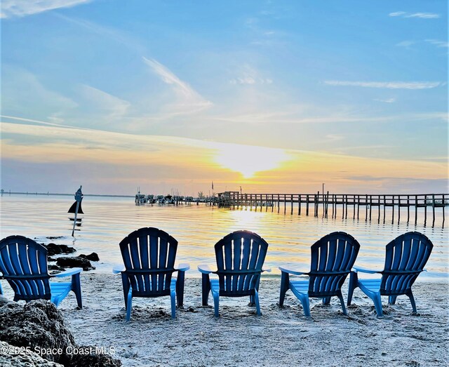 658 Ervin St, Sebastian, FL 32958 - patio terrace at dusk with a water view