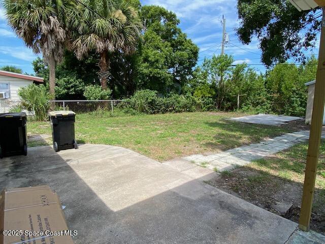 3037 Rowe St NE, Palm Bay, FL 32905 - view of yard with a patio