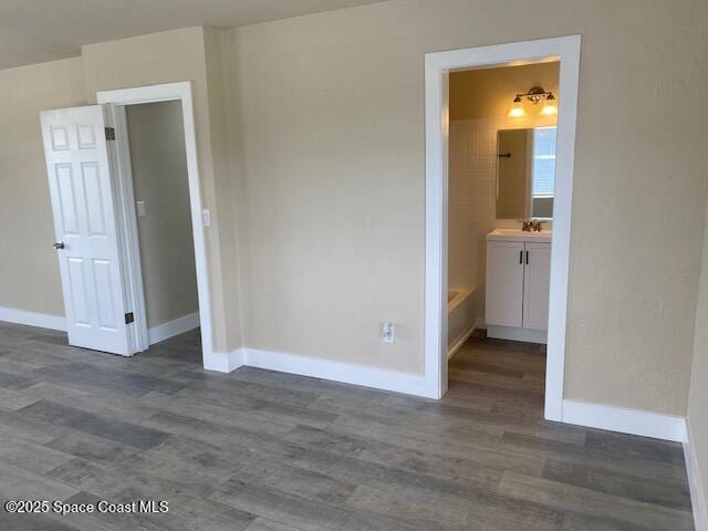 3037 Rowe St NE, Palm Bay, FL 32905 - spare room featuring wood finished floors