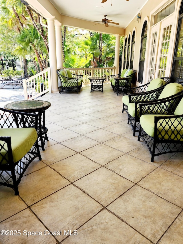 6470 Borasco Dr Unit 2102, Melbourne, FL 32940 - view of patio featuring outdoor lounge area, ceiling fan, and french doors