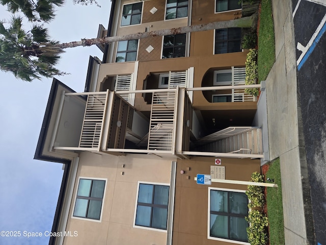 6470 Borasco Dr Unit 2102, Melbourne, FL 32940 - view of apartment building / complex