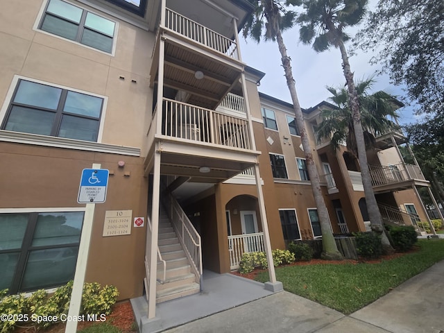 6470 Borasco Dr Unit 2102, Melbourne, FL 32940 - view of property featuring stairway
