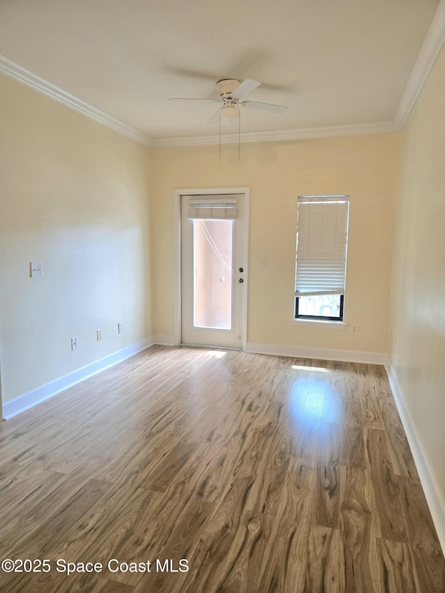 6470 Borasco Dr Unit 2102, Melbourne, FL 32940 - unfurnished room featuring a ceiling fan, wood finished floors, and crown molding