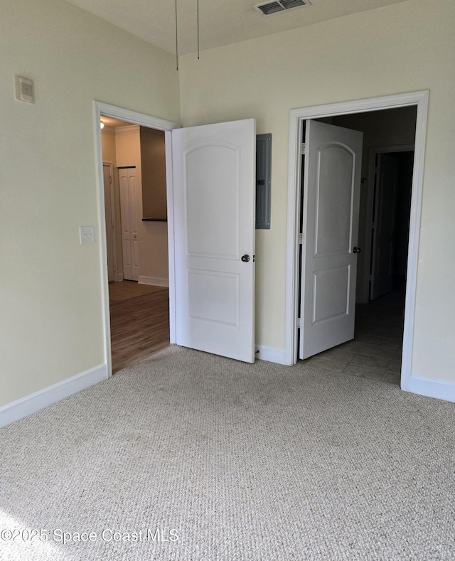 6470 Borasco Dr Unit 2102, Melbourne, FL 32940 - unfurnished bedroom featuring light colored carpet and baseboards