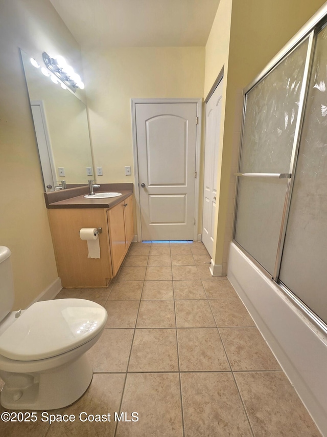 6470 Borasco Dr Unit 2102, Melbourne, FL 32940 - full bathroom with vanity, tile patterned flooring, and enclosed tub / shower combo
