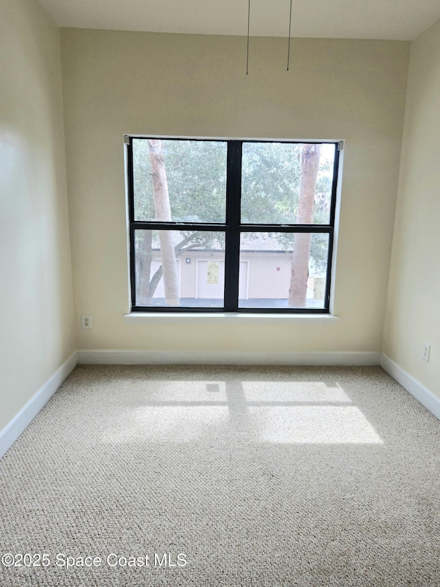 6470 Borasco Dr Unit 2102, Melbourne, FL 32940 - spare room with carpet floors and baseboards