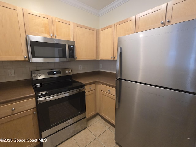 6470 Borasco Dr Unit 2102, Melbourne, FL 32940 - kitchen featuring stainless steel appliances, crown molding, dark countertops, decorative backsplash, and light brown cabinetry