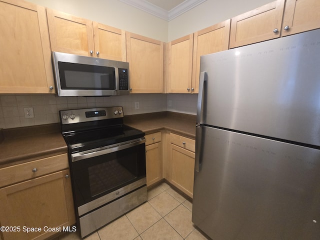 6470 Borasco Dr Unit 2102, Melbourne, FL 32940 - kitchen featuring appliances with stainless steel finishes, ornamental molding, dark countertops, light brown cabinetry, and decorative backsplash