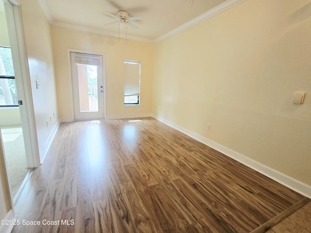 6470 Borasco Dr Unit 2102, Melbourne, FL 32940 - unfurnished room featuring crown molding, wood finished floors, and a ceiling fan