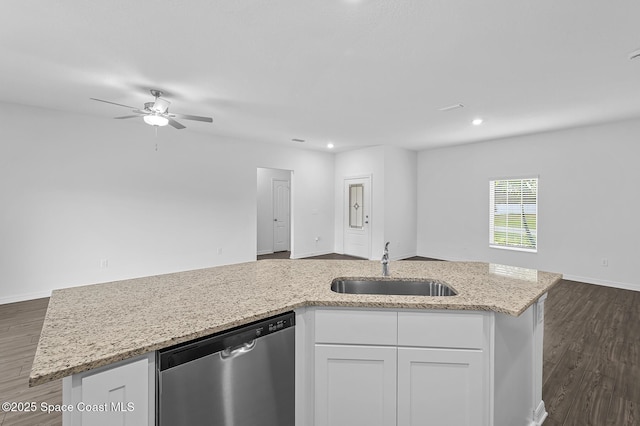 2206 Hialeah St, Palm Bay, FL 32907 - kitchen with dishwasher, open floor plan, ceiling fan, white cabinets, and recessed lighting