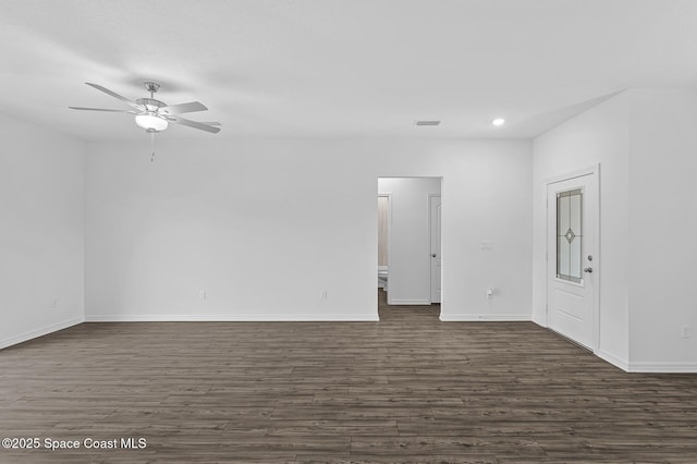 2206 Hialeah St, Palm Bay, FL 32907 - unfurnished room with dark wood-style flooring, a ceiling fan, and recessed lighting