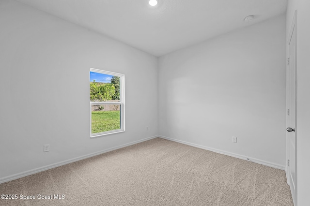2206 Hialeah St, Palm Bay, FL 32907 - carpeted empty room featuring a smoke detector and recessed lighting