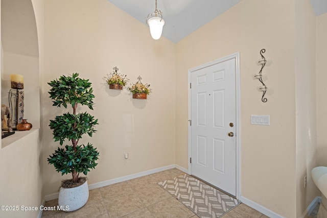 103 Amherst Ln, Sebastian, FL 32958 - entrance foyer featuring light tile patterned floors and baseboards