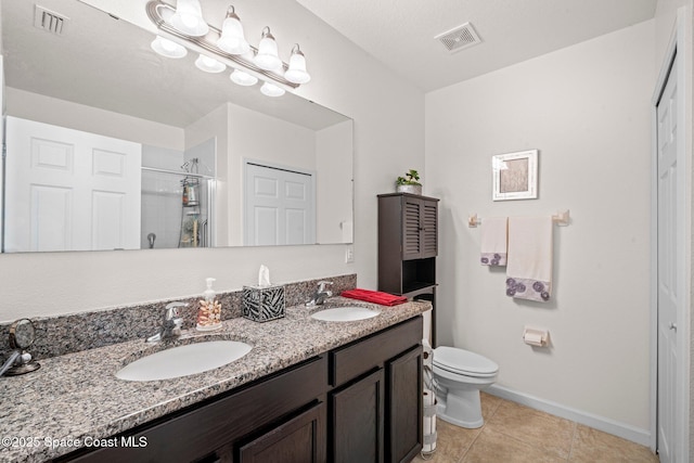 103 Amherst Ln, Sebastian, FL 32958 - full bath featuring double vanity, curtained shower, and tile patterned floors