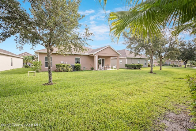 103 Amherst Ln, Sebastian, FL 32958 - ranch-style home featuring stucco siding and a front yard