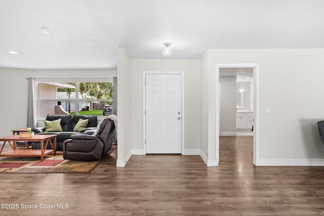 1119 Manatee Dr, Rockledge, FL 32955 - entrance foyer with wood finished floors