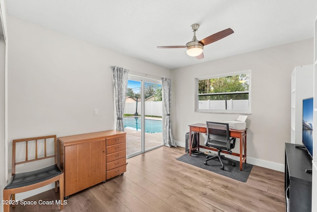 1119 Manatee Dr, Rockledge, FL 32955 - office area featuring light wood-type flooring and a ceiling fan