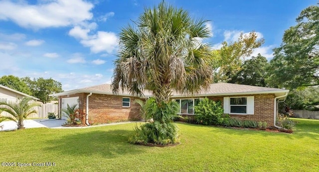 631 Dundee Cir, Melbourne, FL 32904 - single story home featuring an attached garage, brick siding, and concrete driveway