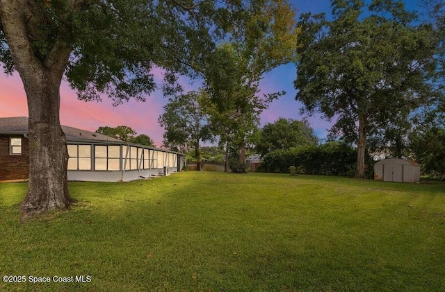 631 Dundee Cir, Melbourne, FL 32904 - view of yard featuring a storage shed