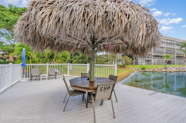 390 W Cocoa Beach Cswy Unit 11-2, Cocoa Beach, FL 32931 - deck with outdoor dining area