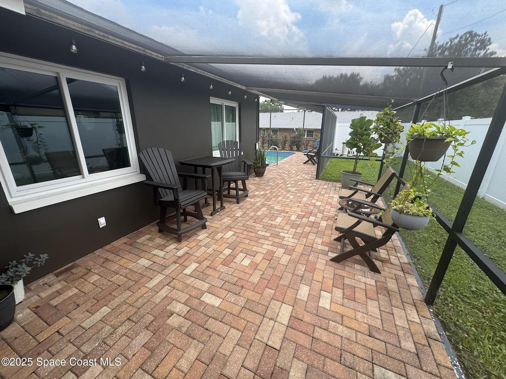 131 Briarwood Ln, Cocoa, FL 32926 - view of patio with a lanai