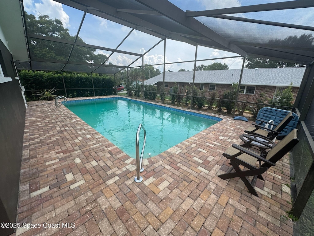131 Briarwood Ln, Cocoa, FL 32926 - view of pool with a patio area and glass enclosure