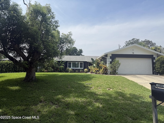 131 Briarwood Ln, Cocoa, FL 32926 - single story home with concrete driveway, a garage, and a front lawn