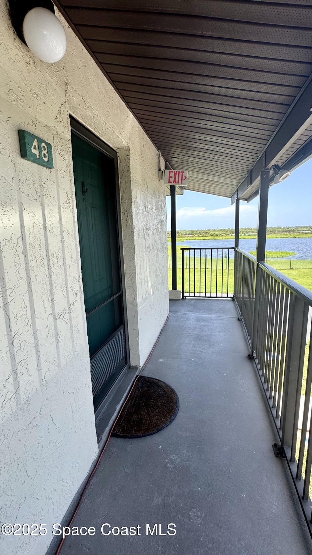 455 Catamaran Dr Unit 48, Merritt Island, FL 32952 - doorway to property with a water view