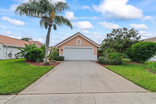 442 Carmel Dr, Melbourne, FL 32940 - view of front of home featuring stucco siding, a front yard, concrete driveway, and an attached garage