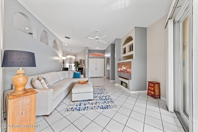 442 Carmel Dr, Melbourne, FL 32940 - living area with light tile patterned floors, ceiling fan, and recessed lighting