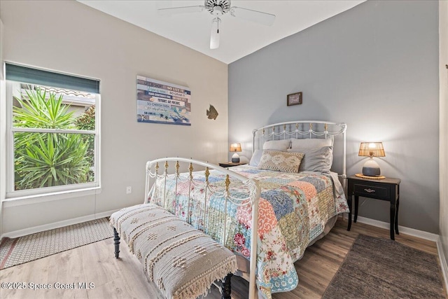 442 Carmel Dr, Melbourne, FL 32940 - bedroom with wood finished floors and ceiling fan