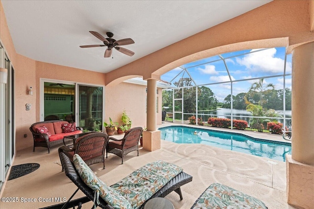 442 Carmel Dr, Melbourne, FL 32940 - outdoor pool with an outdoor hangout area, a water view, a patio, and ceiling fan