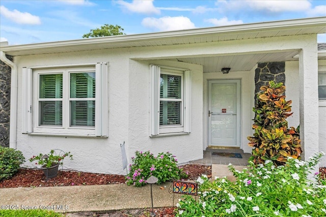 822 Berkshire Dr, Rockledge, FL 32955 - property entrance featuring stucco siding