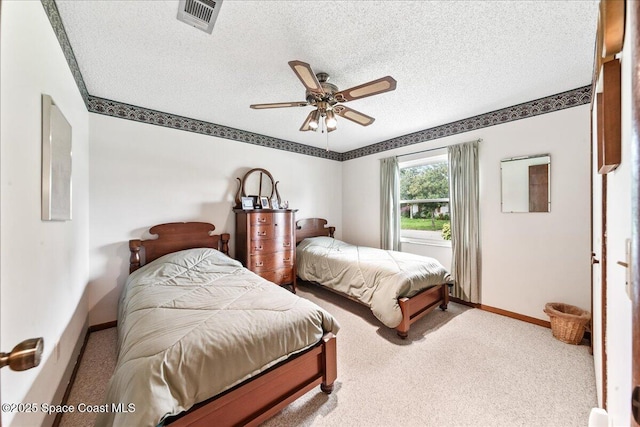 822 Berkshire Dr, Rockledge, FL 32955 - carpeted bedroom with a textured ceiling and ceiling fan