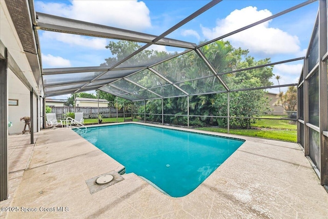 822 Berkshire Dr, Rockledge, FL 32955 - view of swimming pool featuring a patio area, a fenced backyard, and glass enclosure