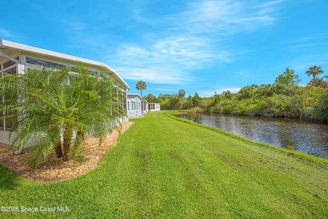 110 Windsong Way, Titusville, FL 32780 - view of grassy yard featuring a water view