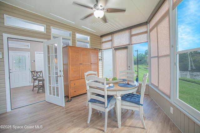 110 Windsong Way, Titusville, FL 32780 - sunroom featuring french doors, a ceiling fan, and outdoor dining area