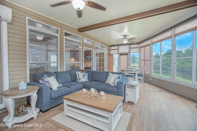 110 Windsong Way, Titusville, FL 32780 - sunroom with ceiling fan, a wall unit AC, and wood walls